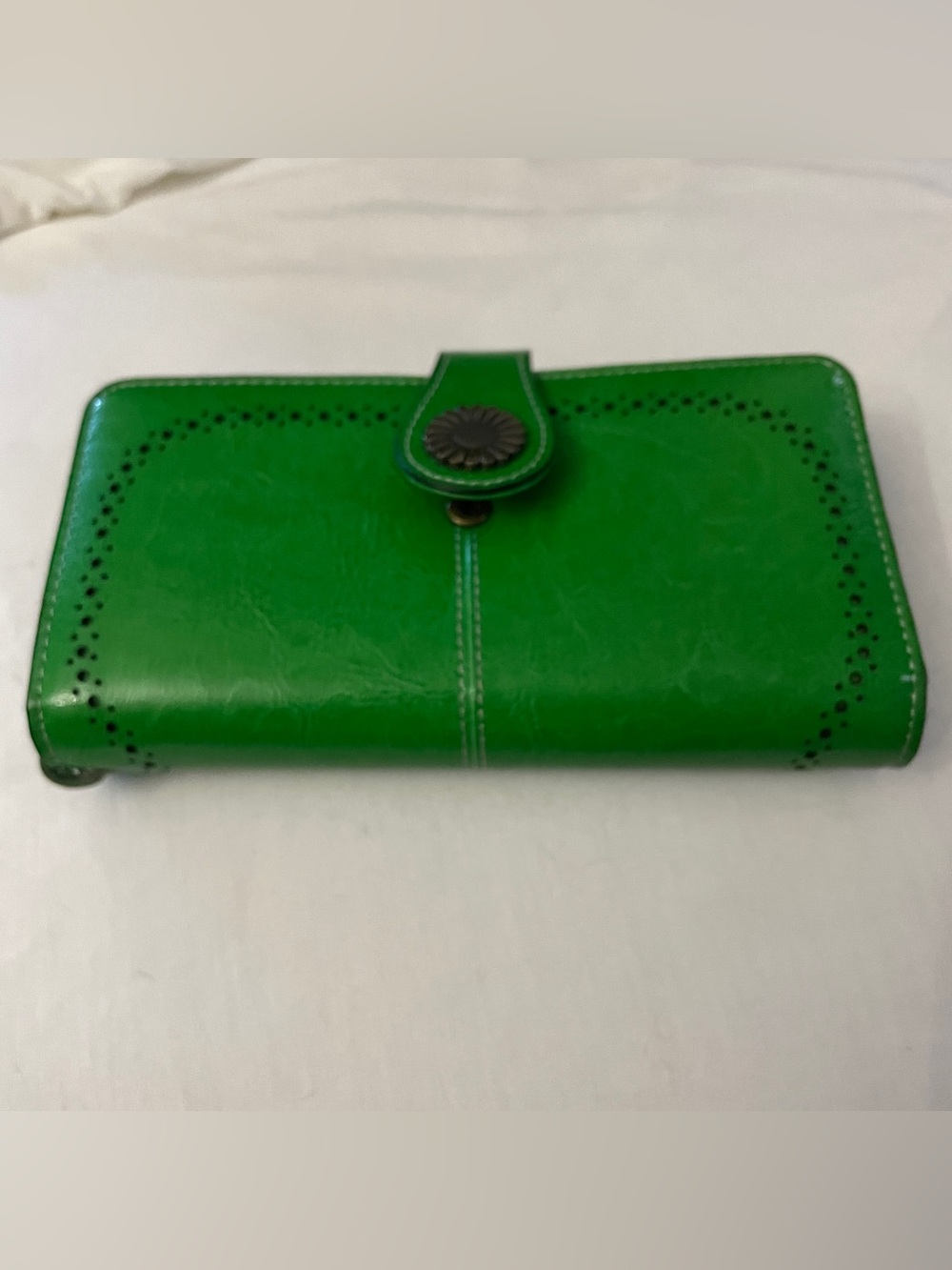Structured Green Flap Wallet with Decorative Medallion